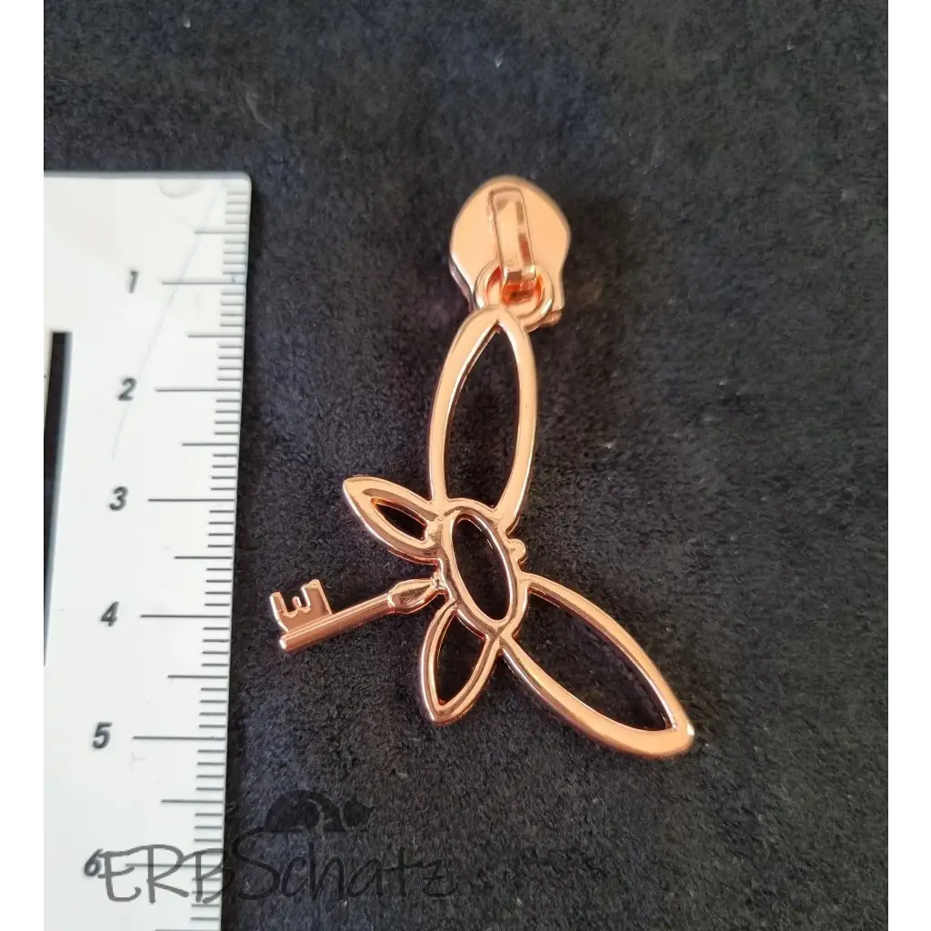 Zipper fliegender Schlüssel - Rosegold